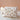 trousse de toilette en double gaze avec un imprimé feuille marron