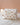 trousse de toilette en double gaze avec un imprimé feuille marron