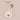 un attache tetine pour enfant chouette de couleur chantilly