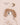 un attache tetine pour enfant lapin de couleur praline