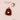 un attache tetine pour enfant poule de couleur sucre brun