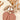 Zoom doudou lapin personnalisable niché dans une feuille