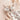 Zoom sur le doudou renard en minky beige latte et petit coeur marron
