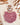doudou personnalisable d'un lion niché dans une framboise